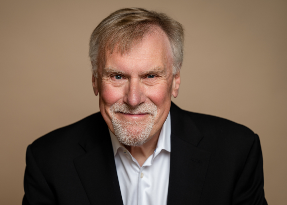 Christopher Hill, PhD,  Co-founder, and Senior Partner